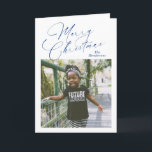Cartes Pour Fêtes Annuelles Élégant script photo Joyeux Noël<br><div class="desc">Carte de Noël photo moderne avec un design simple et minimal avec "Joyeux Noël" dans un élégant script bleu marine avec votre nom de famille au-dessus de votre photo carré préférée. L'intérieur a un collage photo composé de trois images verticales avec votre message personnalisé.</div>