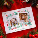 Cartes Pour Fêtes Annuelles Famille 2 Photo Collage Aquarelle de Noël<br><div class="desc">Cette carte de Noël de collage photo de famille comprend deux modèles instantanés de type photo pour vous d'insérer vos photos, avec un arrière - plan de feuillage aquarelle peint à la main comme le houx, les baies, les feuilles verts et les fleurs rouges. Sur le dos est un motif...</div>