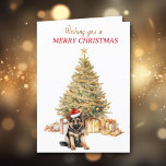 Cartes Pour Fêtes Annuelles Gold Tree Berger allemand Puppy Christmas Card<br><div class="desc">Sur le devant de cette carte de Noël, un adorable chiot berger allemand porte un chapeau de Père Noël rouge et blanc et s'assoit devant un arbre de Noël. L'arbre est décoré d'or, et les paquets cadeaux correspondants sont sous lui. Le texte en or et en rouge dit "Je vous...</div>
