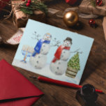 Cartes Pour Fêtes Annuelles Hanukkah et Bonhomme de neige de Noël à l'aquarell<br><div class="desc">Ce design peut être personnalisé dans la zone prévue en changeant la photo et / ou le texte. Ou il peut être personnalisé en choisissant l'option "cliquer pour personnaliser davantage" et en supprimant ou en changeant la couleur de l'arrière-plan, en ajoutant du texte, en changeant la couleur ou le style...</div>