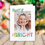 Cartes Pour Fêtes Annuelles Joyeux coloré et lumineux Noël Photo Grey<br><div class="desc">Cette carte de voeux de Noël ludique et brillante présente un texte coloré, lisant "Joyeux & Lumineux" en vert, citron vert, rouge cerise, rose, jaune doré, et aqua. La typographie du mot "Bright" incorpore une conception de papier tissulaire qui se recoupe. Cette carte légère évoque un sens de l'humour, du...</div>