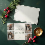 Cartes Pour Fêtes Annuelles Joyeux et brillant Wavy Modern Minimal 4 Photo Col<br><div class="desc">Offrez-vous l'esprit de vacances avec notre Carte photo minimal moderne Merry & Bright Wavy. Cette carte magnifiquement conçue présente un collage photo 4 élégamment encadré dans une bordure ondulée unique. La disposition simple et minimale est agrémentée de subtiles touches ondulées, apportant une touche de sophistication moderne. Le message sincère "Merry...</div>