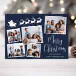 Cartes Pour Fêtes Annuelles Joyeux Noël 5 Photo Père Noël Sleigh Blue<br><div class="desc">Carte Festive de vacances en bleu avec un collage photo de 5 images éparpillées dans des cadres blancs,  une silhouette blanche de rennes volant en traîneau à Père Noël,  "Joyeux Noël" dans un script blanc élégant et votre nom dans une simple typographie blanche moderne.</div>