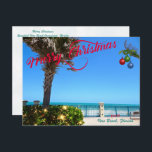 Cartes Pour Fêtes Annuelles Joyeux Noël de Vero Beach Floride Oceanfront<br><div class="desc">Joyeux Noël de Vero Beach, Floride ! Cette carte postale colorée à thème tropical présente une photo d'une belle zone en bord de mer de Vero Beach, tout décorée pour les vacances. Le design festif comprend des lumières de Noël sur la verdure, des boules de Noël accrochées à une façade...</div>