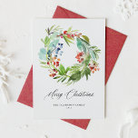 Cartes Pour Fêtes Annuelles Juniper et Holly Wreath Noël<br><div class="desc">Joyeux Noël! Envoyez votre message de vacances à votre famille et à vos amis avec cette carte de Noël aquarelle festive. Il dispose d'une couronne d'aquarelle de baies d'hiver et de verdure. Personnalisez cette carte de vacances botanique avec vos détails. Cette carte de Noël aquarelle est disponible sur d'autres cartes....</div>