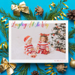 Cartes Pour Fêtes Annuelles Laughing All Way Cute Rainbow Christmas Photo<br><div class="desc">Belle photo horizontale colorée carte de Noël avec Laughing All the Way en joli arc-en-ciel écriture cursive. Personnalisez avec votre photo de famille préférée de vos enfants souriants au-dessus de votre nom ou salutation personnalisée en rouge. Cartes de fin de année amusants et joyeux avec une 2ème photo sur le...</div>