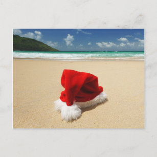 Cartes Pour Fêtes Annuelles Le casquette de Père Noël sur une plage tropicale
