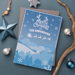 Cartes Pour Fêtes Annuelles Le Père Noël Sleigh et Reindeer volent dans le cie<br><div class="desc">Venez dans l'esprit festif avec cette carte de Noël adorable ! Imaginez un traîneau à Père Noël planant au-dessus d'une ville scintillante, dépoussiéré de flocons de neige contre un ciel bleu onirique. C'est comme une touche de magie dans chaque pli ! Partagez la joie et les joyeux moments des fêtes...</div>