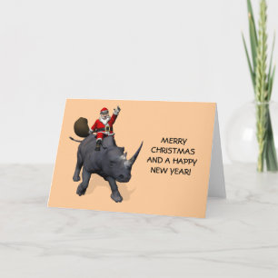Cartes Pour Fêtes Annuelles Le père noël sur le rhinocéros de rhinocéros