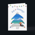 Cartes Pour Fêtes Annuelles Mer et salutations amusantes Plage de Noël<br><div class="desc">Souhaitez-les Joyeuses Fêtes cette saison de vacances avec cette drôle et mignonne carte de Noël de la plage photo avec le salut, "Seas & Salutations" en police voûtée avec une plage de sable blanc, un parapluie de plage rouge, et un paysage marin à l'intérieur d'un arbre de Noël géant !...</div>