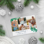 Cartes Pour Fêtes Annuelles Mistletoe Twigs Photo Collage Happy Holidays<br><div class="desc">Photo Christmas card with a photo collage with four vendet pretty mistletoe twigs in green and pale blue. Happy holidays est des battements dans un script de charming. Add your familiy name and the year in élégant blue fonts. Les doctorats ont été matching mistletoe in white and navy blue.</div>