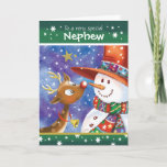 Cartes Pour Fêtes Annuelles Nephew, Cute Reindeer et Snowman<br><div class="desc">Pour Nephew. Une carte de Noël vraiment mignonne et colorée. L'illustration montre un cerf de bébé doux avec de grands yeux ouverts et un bonhomme de neige amusant dans un énorme casquette regardant avec tendresse, nez à nez, l'un à l'autre. Ils sont dressés contre un ciel bleu aquarelle et la...</div>