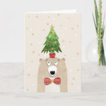 Ours mignon de Noël avec un arbre de Noël sur la t
