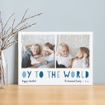 Cartes Pour Fêtes Annuelles Oy to the World | 2 Hanoukka photo<br><div class="desc">Whimsical Hanoukka carte photo présente deux de vos photos de famille préférées dans un format carré aligné côte à côte. "Oy to the World" apparaît sous la forme d'une lettre découpée bleue. Personnalisez avec votre nom de famille ou vos noms, des salutations personnalisées et l'année le long du bas. Une...</div>