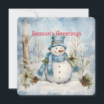 Cartes Pour Fêtes Annuelles Pastel Blue Snowman Pine Cônes Holly Winter Scène<br><div class="desc">Un bleu pastel délicat envahit la scène de la forêt d'hiver avec un bonhomme de neige au milieu des cônes de pin et saint dans cette carte de Noël qui envoie des "Bonnes Fêtes". Personnalisé sur le dos avec votre nom un verset approprié pour les vacances.</div>