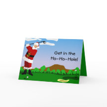 Père Noël jouant au golf