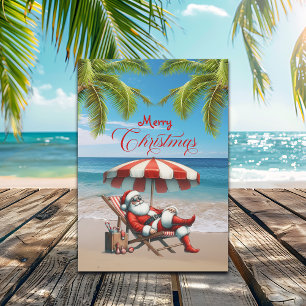 Cartes Pour Fêtes Annuelles Père Noël sous un parasol de plage de Noël