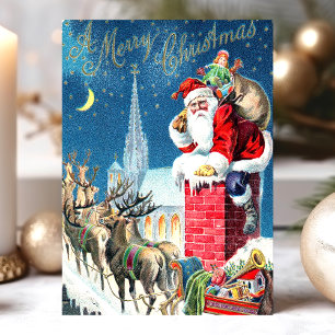 Cartes Pour Fêtes Annuelles Père Noël sur une cheminée avec des rennes sur une