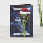 Cartes Pour Fêtes Annuelles Petit Homme Vert Alien Espace Noël<br><div class="desc">Petit alien vert dans un chapeau de Santa est parfait pour les amateurs de science fi sur votre liste de Noël ! Cette carte de vacances unique, thématique espace, saura vous apporter beaucoup de sourires ! Avant de la carte dit, "Bonnes Fêtes, Earthling !" A l'intérieur dit "J'espère que vos...</div>