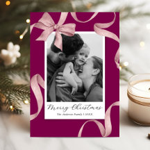 Photo de Noël avec un élégant nœud rose