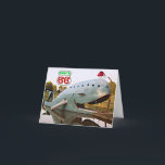 Cartes Pour Fêtes Annuelles Route 66 Catoosa Blue Whale Christmas Santa Hat<br><div class="desc">Visiter la Baleine Bleue de Catoosa,  Oklahoma le long de la Route 66 est magique à tout moment de l'année. Le favori de Roadside America est normalement vu porter un casquette de baseball. Cependant,  pour Noël cette image d'imaginaire montre la baleine portant un chapeau de Père Noël.</div>