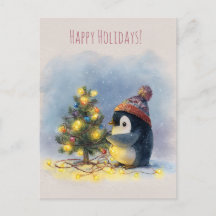 Small penguin decorates tiny Christmas tree,