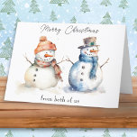 Cartes Pour Fêtes Annuelles Snowman De Nous Deux Joyeux Salutation De Noël<br><div class="desc">Une charmante carte de Noël avec une photo en aquarelle d'un couple de bonhomme de neige se tenant la main. L'accueil en haut est "Joyeux Noël" dans la typographie festive, et sous la photo le texte est "de nous deux". Le message de bienvenue "Joyeux Noël" se trouve également à l'intérieur...</div>