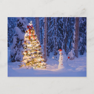 Cartes Pour Fêtes Annuelles Snowman et sapin de Noël dans la nuit d'hiver