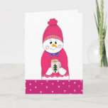 Cartes Pour Fêtes Annuelles Snowman rose givré avec chocolat chaud<br><div class="desc">Une carte de voeux de vacances mignonne avec une fille neigeuse gelée en toque rose et pull rose. Un chocolat chaud entre ses mains. Le message intérieur peut être supprimé ou modifié selon vos besoins.</div>