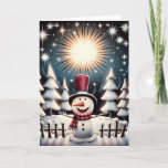 Cartes Pour Fêtes Annuelles Sparkling Snowman Joy<br><div class="desc">Notre joyeux bonhomme de neige se tient les bras ouverts dans une forêt enneigée sous un ciel scintillant rempli d'étoiles. Il accueille la magie de la saison. Habillé de son chapeau rouge festif et d'un écharpe rayé, chaleureux et douillet. Il brille de façon éclatante, entouré d'arbres dépoli et de petits...</div>