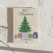 Cartes Pour Fêtes Annuelles Un arbre de Noël vert et irrégulier présente une p