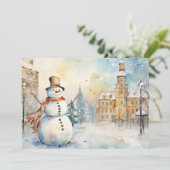 Cartes Pour Fêtes Annuelles Un bonhomme de neige lunatique joyeux dans un vill (Debout devant)
