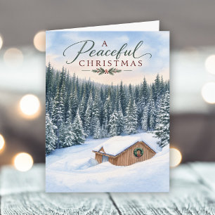 Cartes Pour Fêtes Annuelles Un chalet de montagne enneigé pour un Noël paisibl