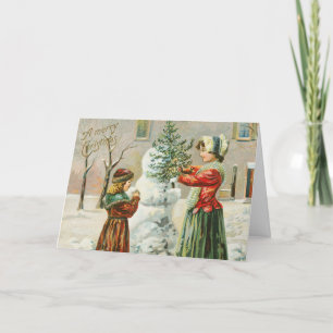 Cartes Pour Fêtes Annuelles Une joyeuse femme de Noël, un enfant et un bonhomm