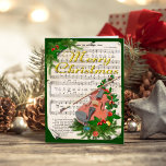 Cartes Pour Fêtes Annuelles Vintage Christmas Sheet Musique Violon<br><div class="desc">Ce design de style vintage est orné d'un violon décoré de feuilles saints, de baies et de sprigs de pin, et d'un feuilleton de Noël vintage dans l'arrière - plan, également décoré de sprigs de pin et de feuilles saints. Le design festif de Noël a un arrière - plan vert...</div>