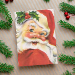 Cartes Pour Fêtes Annuelles Vintage Holly Jolly Santa Claus<br><div class="desc">Cette carte de Noël vintage du milieu du siècle présente un saint Père Noël joyeux avec un nez de cerise, des joues roses, un costume rouge et un casquette, un scintillement dans l'oeil et une pointe de mistletoe. Le sentiment à l'intérieur de la carte dit : "Que votre saison des...</div>