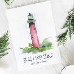 Cartes Pour Fêtes Annuelles Watercolor Lighthouse Florida Beach Christmas<br><div class="desc">This Coastal theme Christmas card features my original hand painted watercolor Jupiter, Florida lighthouse in shades of red on a crisp white background. The words Seas and Greetings are set in a modern brush script typography in navy blue. The inside features a solid blue color with your custom greeting in...</div>