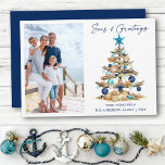 Cartes Pour Fêtes Annuelles Watercolor Tree Seas and Greetings Photo Beach<br><div class="desc">Modern Minimalist Elegance Calligraphy Ink Pen Handwritten Script Seas & Greetings Coastal Holiday Card includes a Watercolor Christmas Tree make of beach ocean driftwood,  seashells,  sand dollars,  nautical anchor ornament and topped with a starfish. Navy Blue Text. Photo Front.</div>