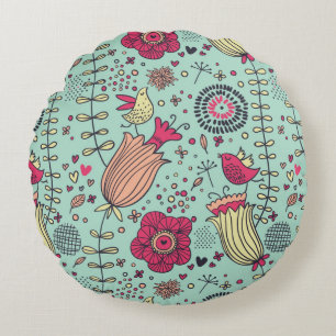 Cartoon floreel patroon met vogels rond kussen