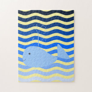 Cartoon walvis en golven legpuzzel