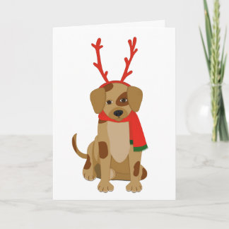 Cartoonhond met gewei en sjaal feestdagen kaart