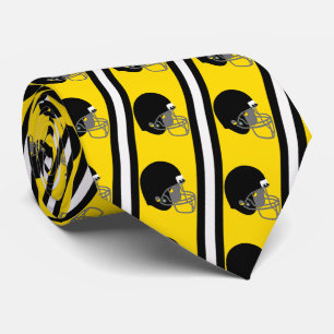 Casque de football noir sur cravate jaune