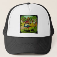 Alice dans le croquet de Flamant rose du pays des