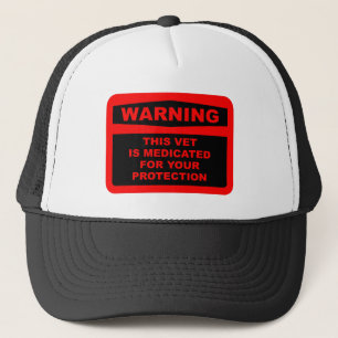 CASQUETTE AVERTISSEMENT : CE VÉTÉRINAIRE EST TRAITÉ AVEC