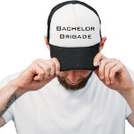 Casquette Bachelor Brigade Black and White Bachelor Party<br><div class="desc">Un design moderne noir et blanc avec les mots "Bachelor Brigade" pour les groomsmen.</div>