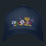 Casquette Brodée Lettres Chanukah<br><div class="desc">Le design Hanoukka présente du texte fait de dreidel,  Menorah,  Star of David et des pièces d'or.</div>