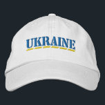 Casquette Brodée Police bleu UKRAINE et jaune<br><div class="desc">Couleurs UKRAINE Couleurs bleu et jaune crayon Police brodée sur le Casquette de coton blanc pour montrer votre soutien à l'Ukraine!</div>