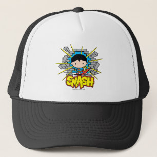 Casquette Chibi Superman Frappant À Travers Un Mur De Brique