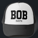 Casquette Funny Bob Here Trucker Hat<br><div class="desc">This funny design features the words,  "BOB here" in bold typography.  You can change the words to whatever you like.  If you need help with customization,  or another personalized item from my stores,  please email me at ybnormalone@gmail.com.  Please see our other Bob items at https://www.zazzle.com/collections/funny_bob_stuff-119162167795449275?rf=238062027169219506</div>