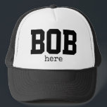 Casquette Funny Bob Here Trucker Hat<br><div class="desc">This funny design features the words,  "BOB here" in bold typography.  You can change the words to whatever you like.  If you need help with customization,  or another personalized item from my stores,  please email me at ybnormalone@gmail.com.  Please see our other Bob items at https://www.zazzle.com/collections/funny_bob_stuff-119162167795449275?rf=238062027169219506</div>